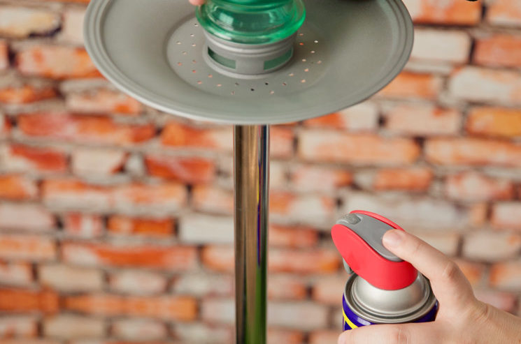 Uses for WD-40 - spraying on pole of bird feeder